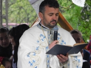 6 priest by wooden church easter in maramures